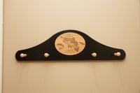 Engraved Medallion Coat Rack